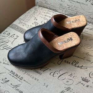 Kork Black Leather Mules with Brown Trim